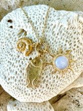 Load image into Gallery viewer, 14kg, Diamond and Carved Calcedony Sun Pendant
