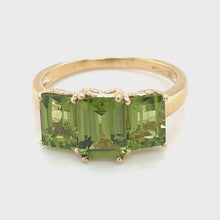 Load and play video in Gallery viewer, 9kt Vintage Emerald Cut Peridot 3-Stone Ring
