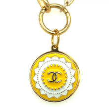 Load and play video in Gallery viewer, Vintage Yellow Chanel Button Pendant
